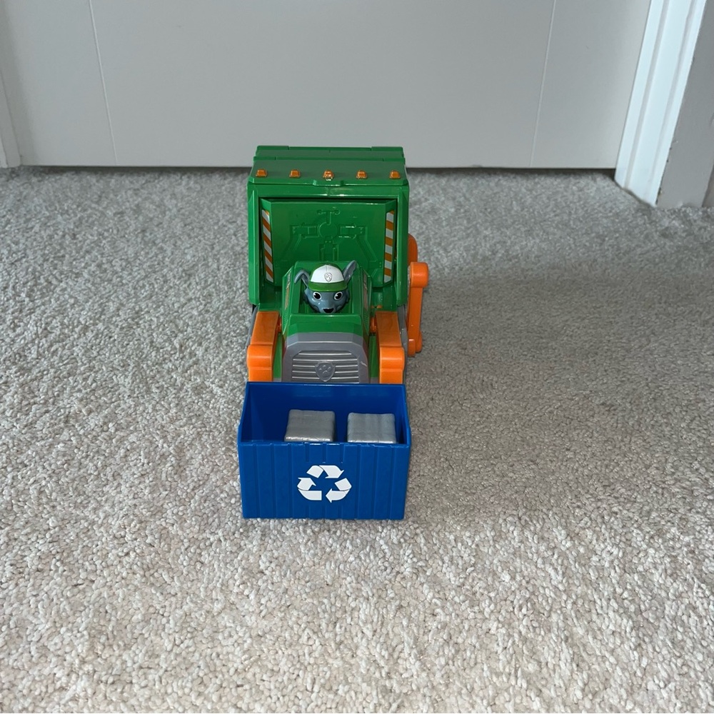 Paw Patrol Rocky Reuse it Truck with Rocky pup figure.